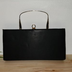 Metal ribbon clutch with hidden handle - 224